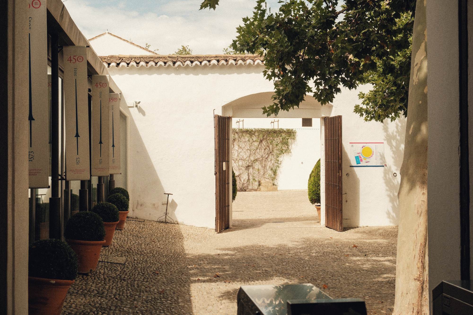A courtyard in the old town seen through an open gate