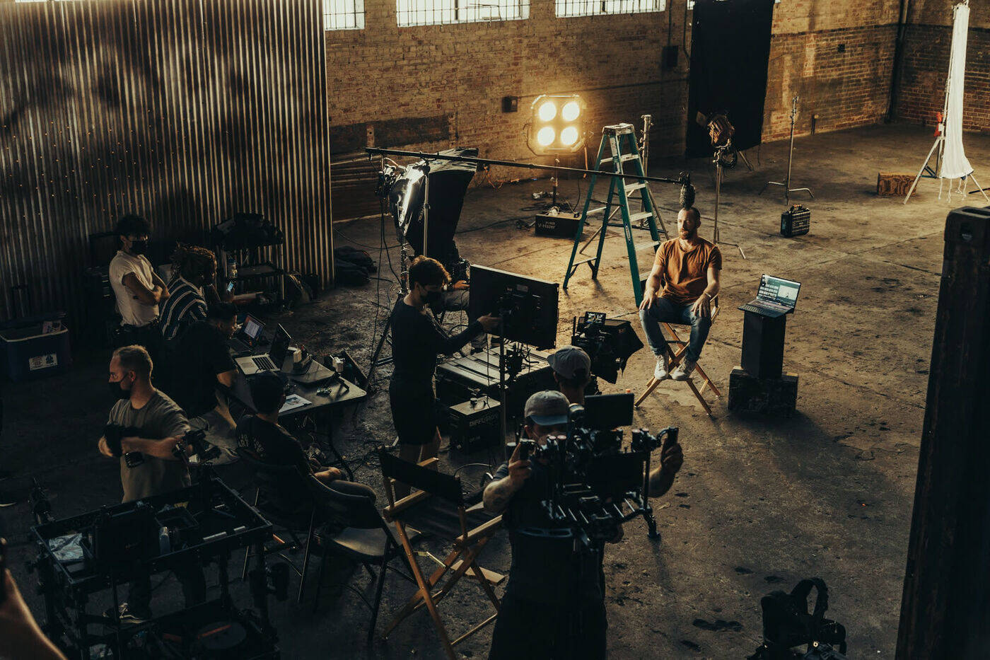 The Northcut crew lighting a set in a warehouse