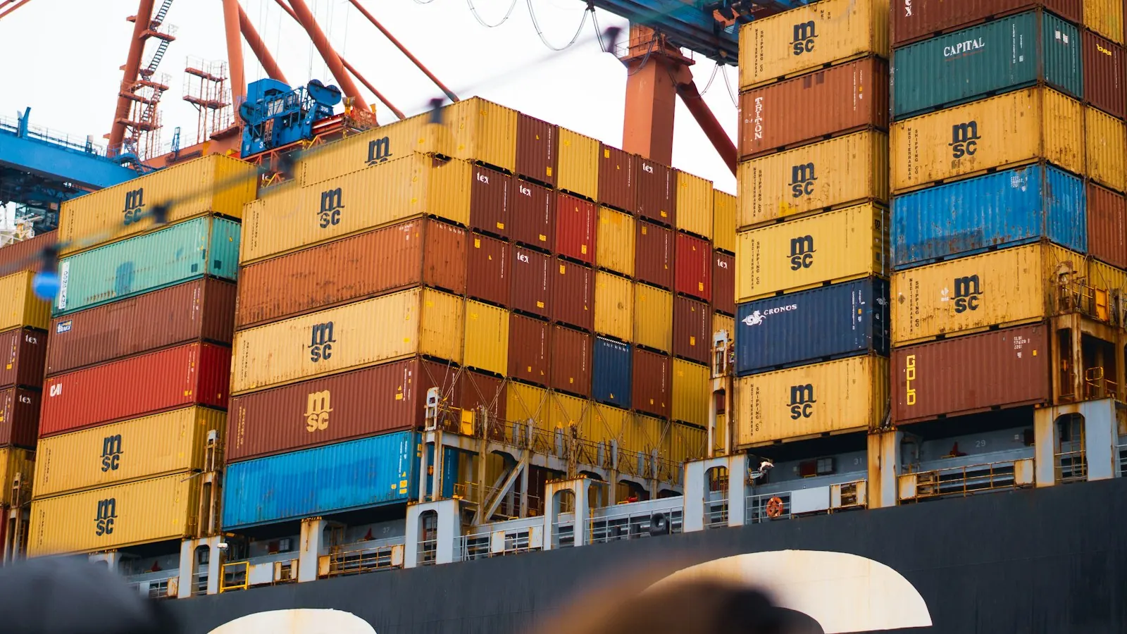 a large cargo ship loaded with lots of containers
